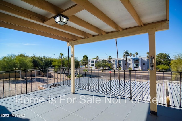 view of patio with fence