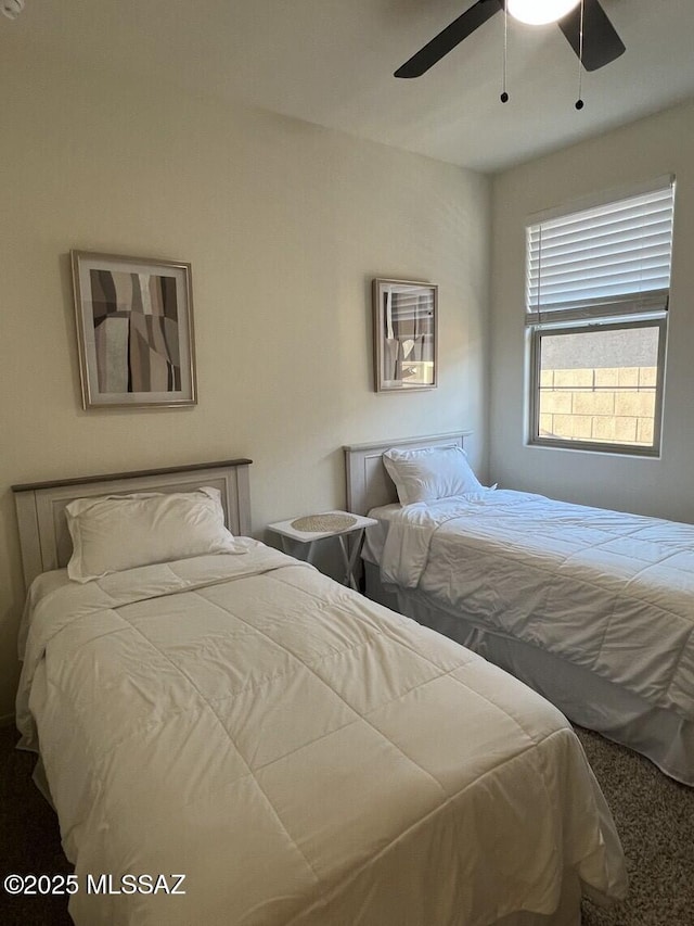 bedroom featuring ceiling fan