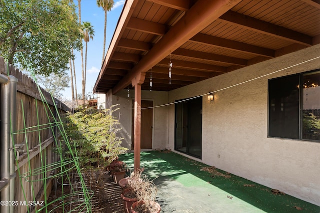 view of patio with fence