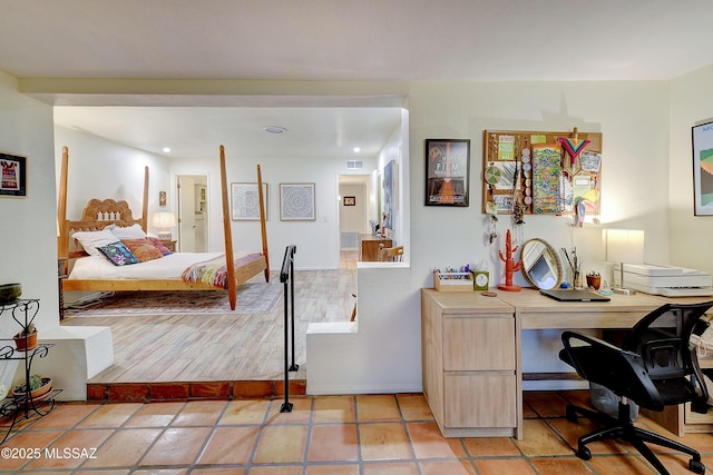 bedroom featuring recessed lighting and baseboards