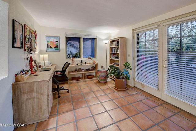 office space featuring light tile patterned floors and french doors