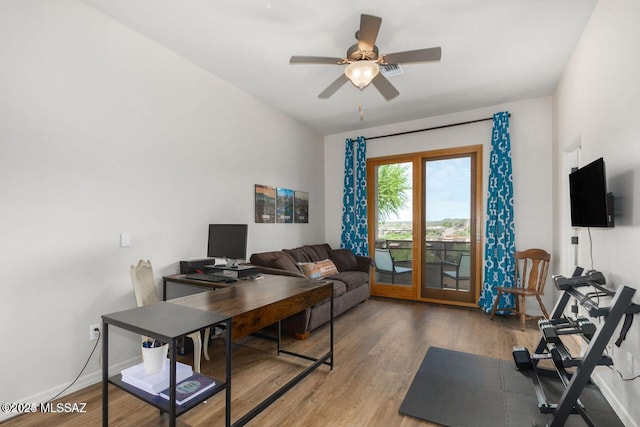 office space with ceiling fan, baseboards, and wood finished floors