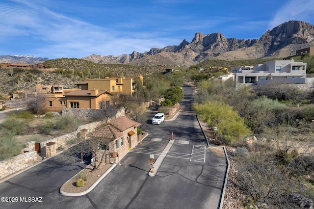 property view of mountains featuring a residential view