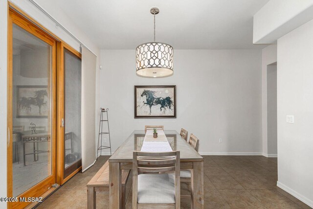 tiled dining area with baseboards