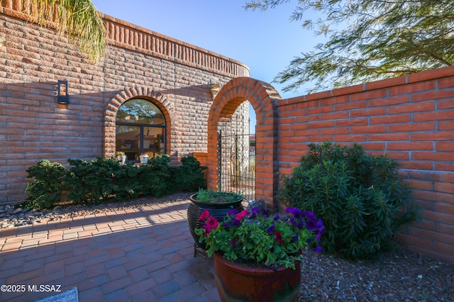 view of patio / terrace featuring a gate