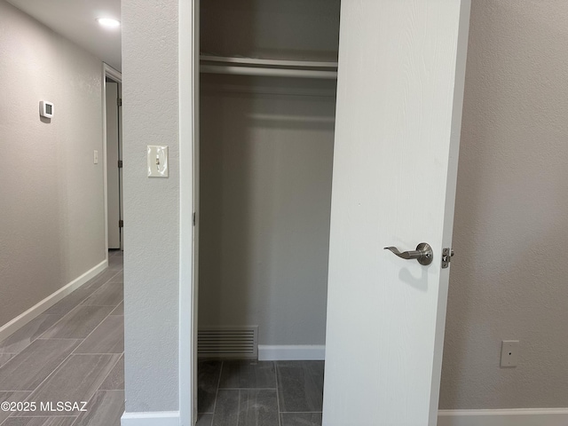 closet featuring visible vents