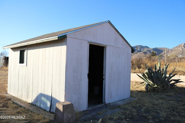 view of shed featuring a mountain view