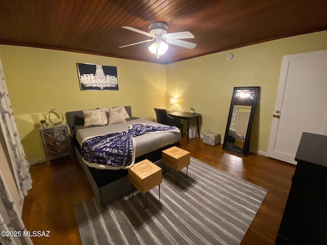 bedroom with ceiling fan, wooden ceiling, wood finished floors, and baseboards