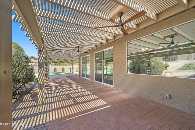 view of patio with ceiling fan, a fenced in pool, and a pergola