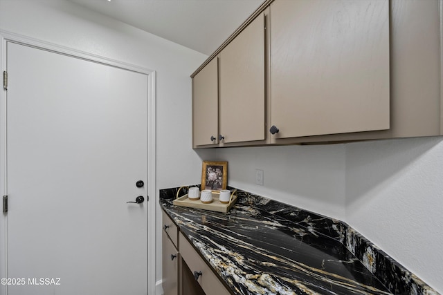 kitchen with dark countertops