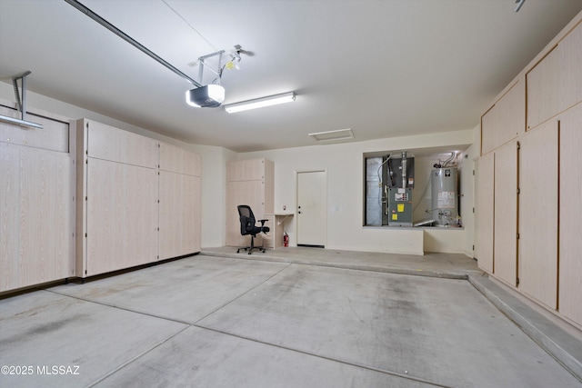 garage featuring heating unit, water heater, and a garage door opener