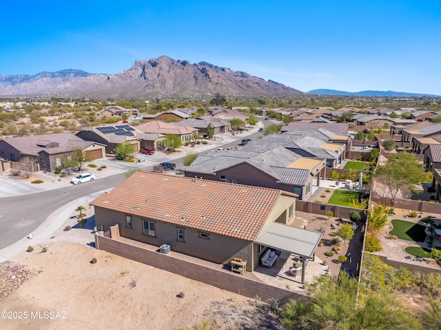 drone / aerial view with a residential view and a mountain view