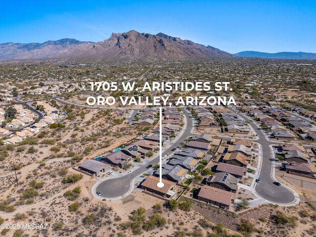 aerial view with a residential view and a mountain view