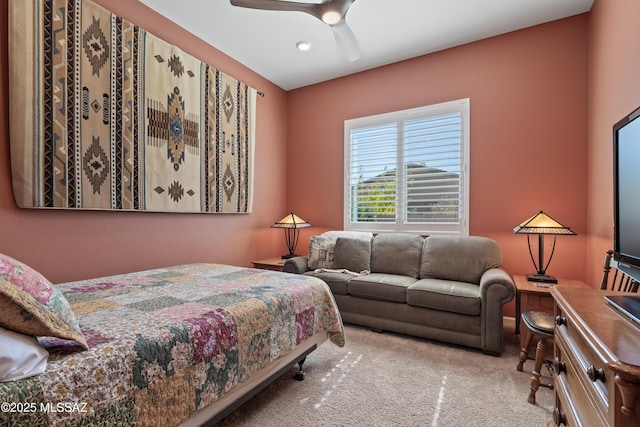 carpeted bedroom featuring ceiling fan