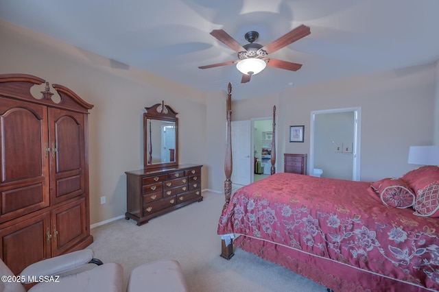 bedroom with baseboards, a ceiling fan, and light colored carpet