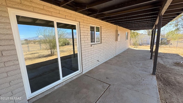 view of patio / terrace with fence