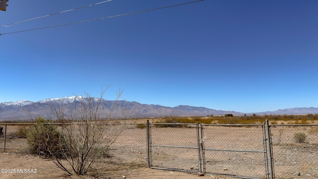 view of mountain feature with a rural view