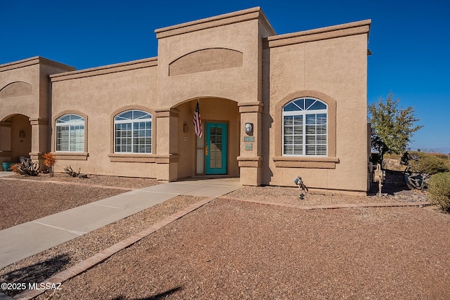 view of front of property featuring stucco siding