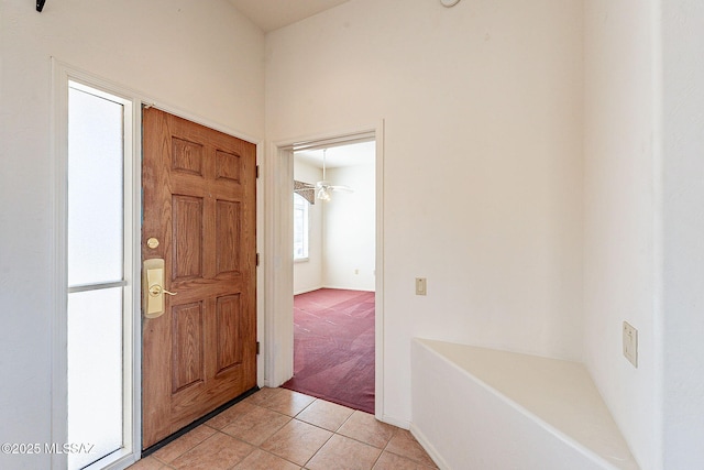 entrance foyer with light tile patterned floors