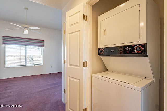 laundry room with laundry area, a ceiling fan, baseboards, stacked washer / drying machine, and dark carpet