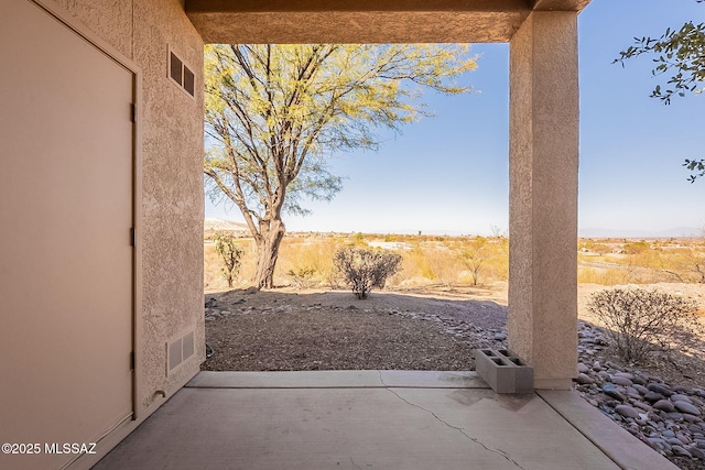 view of patio / terrace with visible vents