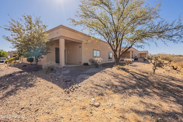 view of front of house with stucco siding