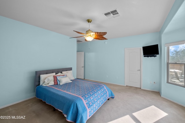 bedroom featuring baseboards, visible vents, and carpet flooring