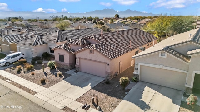 aerial view featuring a residential view and a mountain view