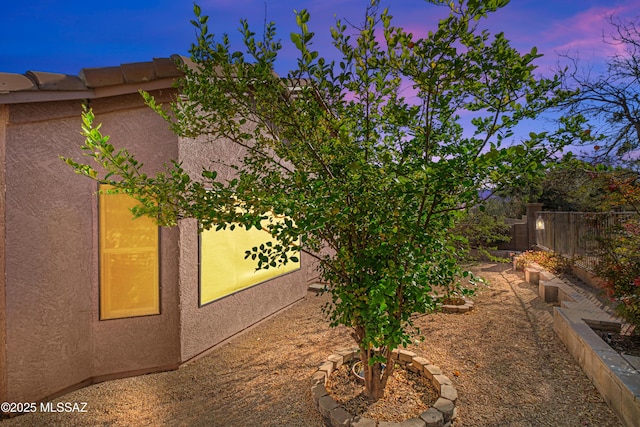 1381 W Camino Buenos Aires, Sahuarita, AZ 85629 - view of side of home featuring stucco siding