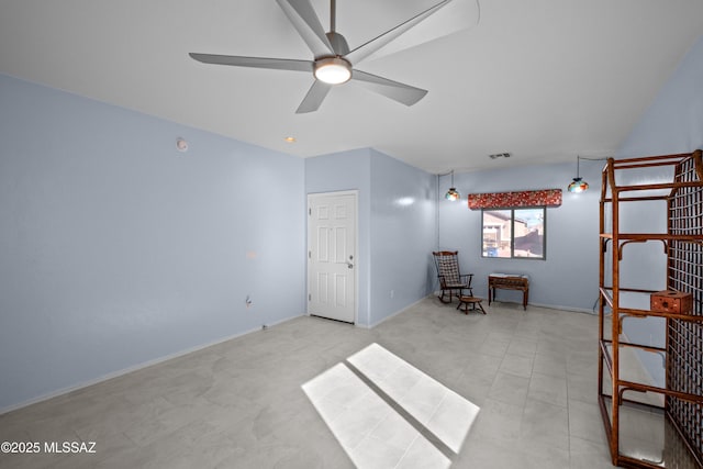 unfurnished room featuring ceiling fan, visible vents, and baseboards