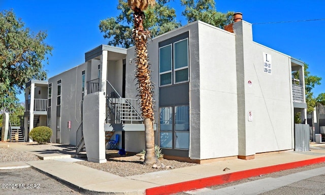 view of property with stairway