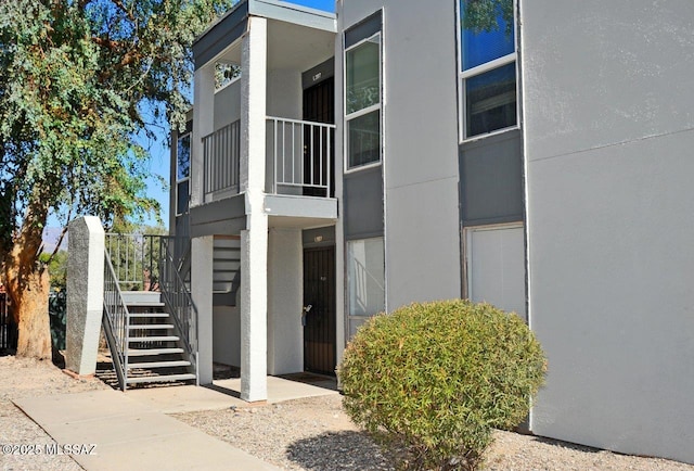 view of property with stairs