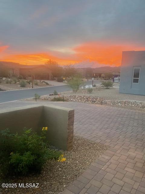 view of patio terrace at dusk