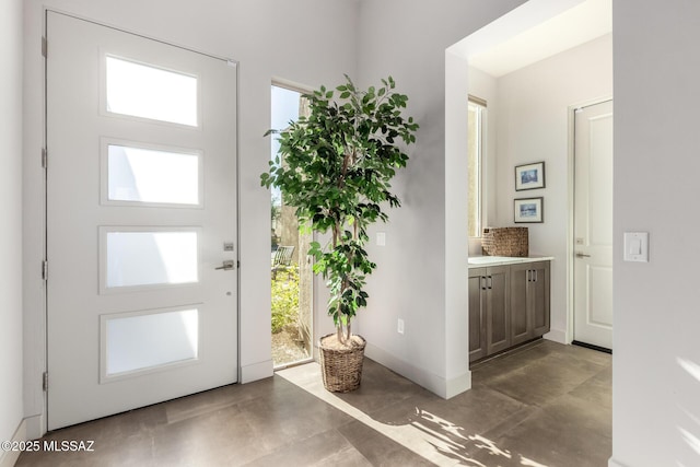 entrance foyer featuring baseboards