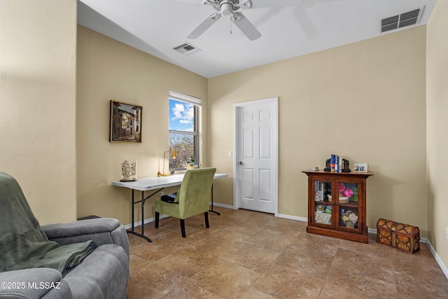 office with visible vents, ceiling fan, and baseboards