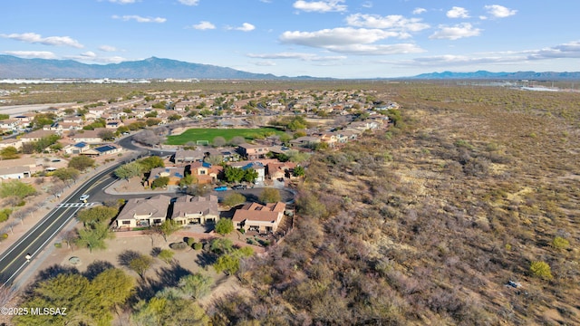 birds eye view of property with a residential view and a mountain view