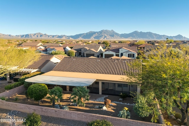 exterior space featuring a residential view and a mountain view