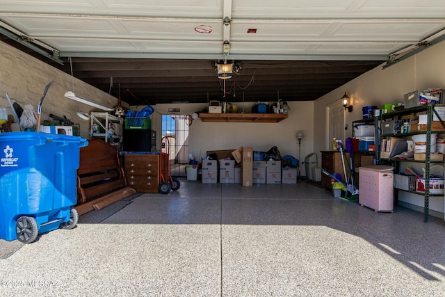 garage featuring a garage door opener