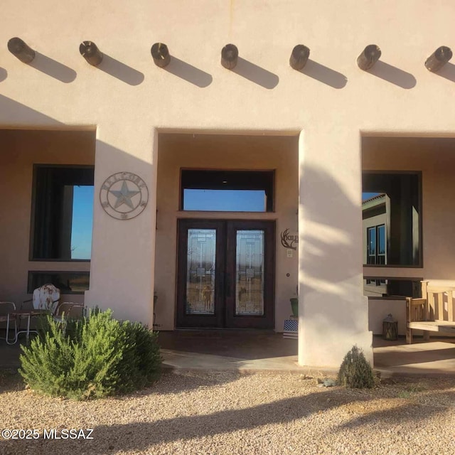 property entrance with french doors