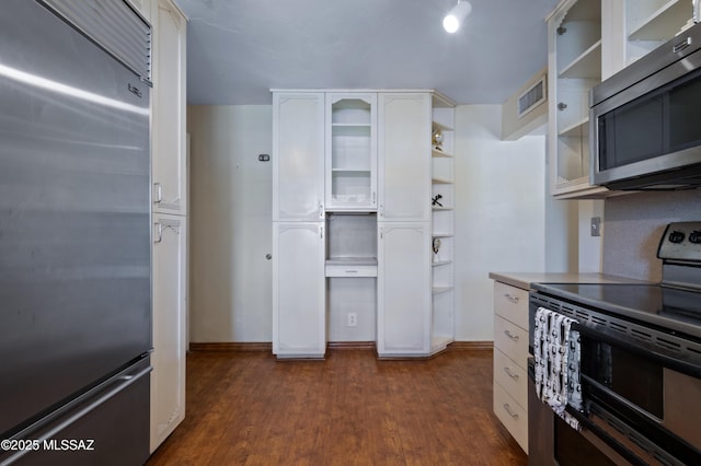 kitchen with visible vents, stainless steel appliances, dark wood-style floors, white cabinetry, and open shelves