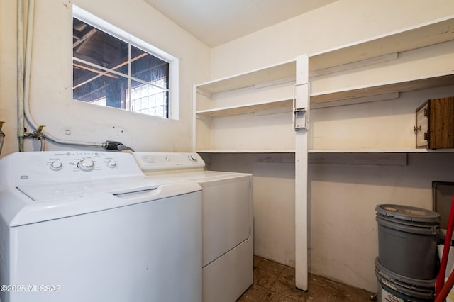 laundry room with independent washer and dryer and laundry area