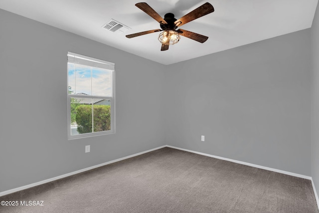 14241 E Bolster Dr, Vail, AZ 85641 - spare room featuring carpet, baseboards, and ceiling fan