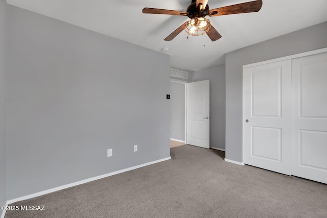 14241 E Bolster Dr, Vail, AZ 85641 - unfurnished bedroom with carpet flooring, baseboards, a closet, and ceiling fan