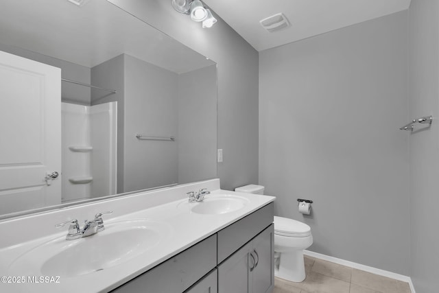 14241 E Bolster Dr, Vail, AZ 85641 - bathroom with toilet, double vanity, tile patterned flooring, baseboards, and a shower