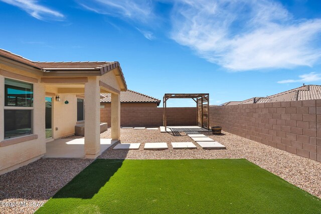 14241 E Bolster Dr, Vail, AZ 85641 - fenced backyard with a patio area