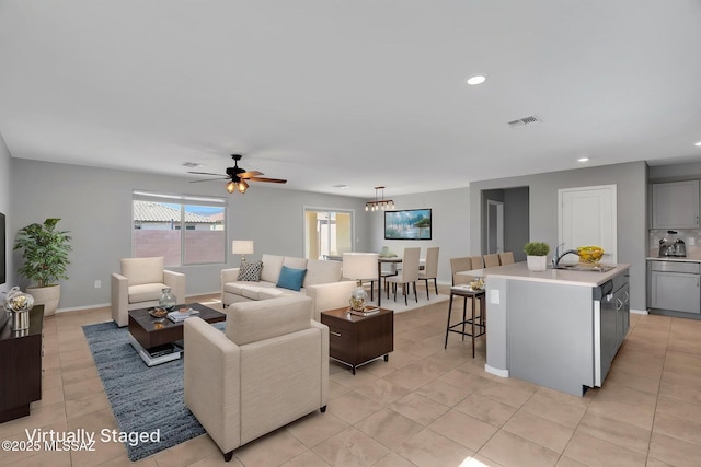14241 E Bolster Dr, Vail, AZ 85641 - living room featuring light tile patterned flooring, ceiling fan, recessed lighting, and baseboards
