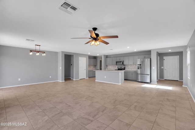 14241 E Bolster Dr, Vail, AZ 85641 - unfurnished living room featuring a ceiling fan, recessed lighting, baseboards, and light tile patterned flooring