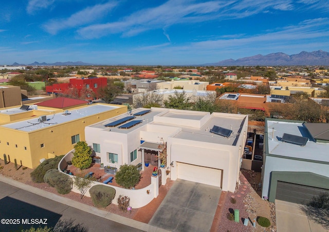 bird's eye view with a mountain view