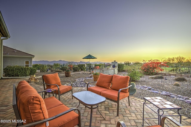 13517 N Heritage Gateway Ave, Marana, AZ 85658 - view of patio with a mountain view, an outdoor hangout area, outdoor dining space, and fence