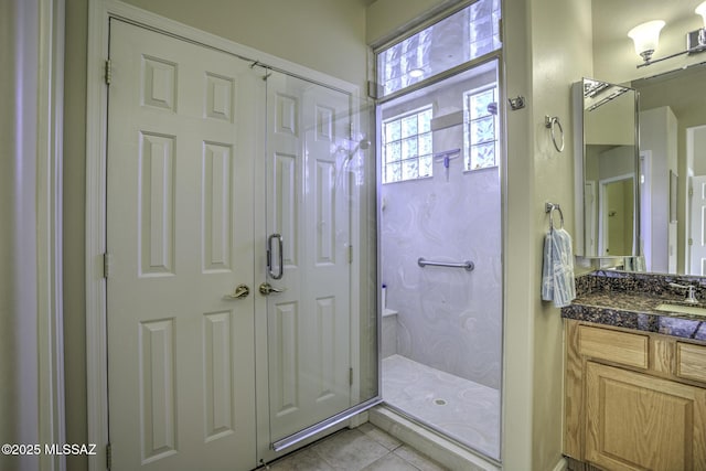 13517 N Heritage Gateway Ave, Marana, AZ 85658 - full bathroom featuring tile patterned floors, vanity, and walk in shower